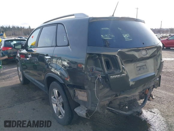 2012 Kia Sorento EX with VIN 5XYKUCA68CG275924, listed as a IAAI auction lot 41623363 with 173,078 mi miles. Bid and sale history available at carsss.com. Image 3.