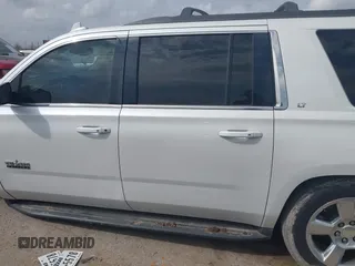 2016 Chevrolet Suburban LT with VIN 1GNSCHKC9GR273201, listed as a IAAI auction lot 41743971 with 180,945 mi miles. Bid and sale history available at carsss.com. Image 14.
