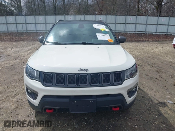 2019 Jeep Compass Trailhawk with VIN 3C4NJDDB0KT733175, listed as a IAAI auction lot 41724527 with 82,574 mi miles and . Bid and sale history available at carsss.com. Image 13.