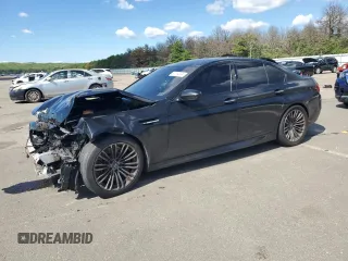 2014 BMW M5 z VIN WBSFV9C53ED594132, wystawiony jako Copart lot #67114384 z przebiegiem 89 020 mil mil oraz Szkoda całkowita • Salvage title. Historia ofert i sprzedaży dostępna na DreamBid. Obrazek 1.
