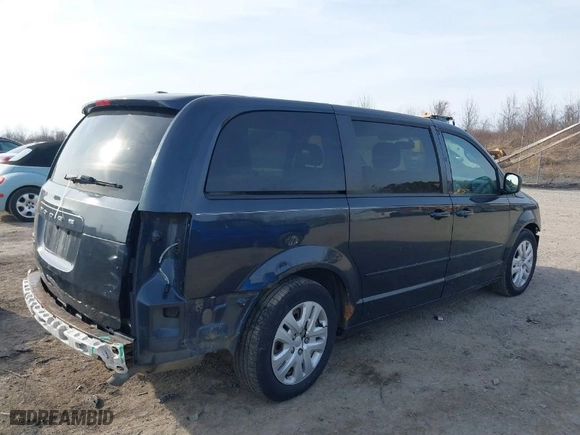 2014 Dodge Grand Caravan SE with VIN 2C4RDGBG9ER473567, listed as a IAAI auction lot 41800380 with 116,210 mi miles. Bid and sale history available at carsss.com. Image 4.