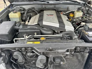 2001 Lexus LX 470 z VIN JTJHT00W313508801, wystawiony jako Copart lot #60938545 z przebiegiem 118 013 mil mil oraz Czysty tytuł • Clean title. Historia ofert i sprzedaży dostępna na DreamBid. Obrazek 7.
