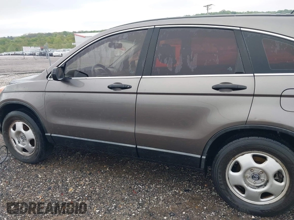 2010 Honda CR-V LX z VIN 5J6RE3H38AL000217, wystawiony jako IAAI lot #42051176 z przebiegiem 221 590 mil mil oraz . Historia ofert i sprzedaży dostępna na DreamBid. Obrazek 14.