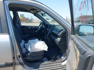 2003 Honda CR-V LX z VIN JHLRD68453C004928, wystawiony jako IAAI lot #42452176 z przebiegiem 258 092 mil mil oraz . Historia ofert i sprzedaży dostępna na DreamBid. Obrazek 5.
