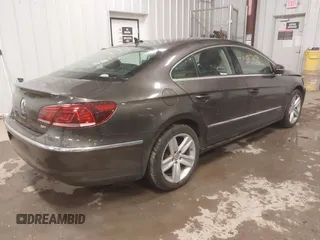 2015 Volkswagen CC R-Line z VIN WVWBP7AN0FE829797, wystawiony jako IAAI lot #41296150 z przebiegiem 138 608 mil mil oraz . Historia ofert i sprzedaży dostępna na DreamBid. Obrazek 4.