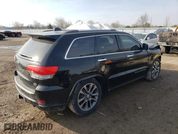 2018 Jeep Grand Cherokee Overland with VIN 1C4RJFCG8JC262591, listed as a Copart auction lot 47814985 with 135,542 mi miles and Salvage Title. Bid and sale history available at carsss.com. Image 3.