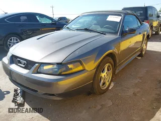 2003 Ford Mustang Deluxe z VIN 1FAFP44473F341011, wystawiony jako IAAI lot #42715064 z przebiegiem 177 458 mil mil oraz . Historia ofert i sprzedaży dostępna na DreamBid. Obrazek 2.