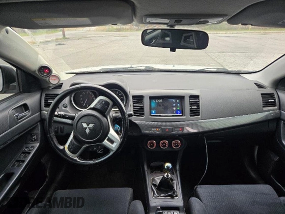 2010 Mitsubishi Lancer Evolution GSR with VIN JA32W8FV3AU021698, listed as a Copart auction lot 80026994 with 10,075 mi miles and Clean Title. Bid and sale history available at DreamBid. Image 9.