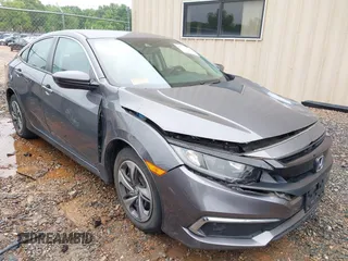 2021 Honda Civic LX with VIN 2HGFC2F6XMH556442, listed as a IAAI auction lot 42252316 with 25,375 mi miles and . Bid and sale history available at DreamBid. Image 1.