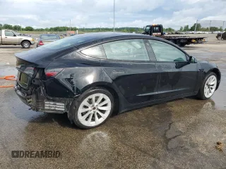 2022 Tesla Model 3 Long Range z VIN 5YJ3E1EB4NF285924, wystawiony jako Copart lot #59734055 z przebiegiem 116 680 mil mil oraz Czysty tytuł • Clean title. Historia ofert i sprzedaży dostępna na DreamBid. Obrazek 3.