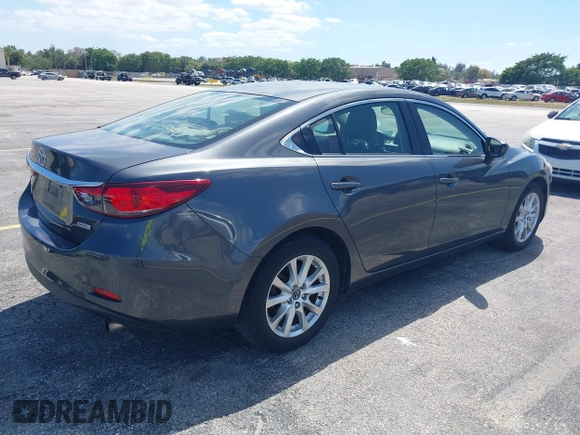 2016 Mazda Mazda6 i Sport with VIN JM1GJ1U5XG1482164, listed as a IAAI auction lot 42052618 with 79,630 mi miles. Bid and sale history available at carsss.com. Image 4.