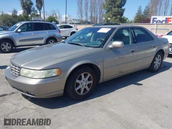 2002 Cadillac Seville Luxury SLS z VIN 1G6KS54Y92U207873, wystawiony jako IAAI lot #41957595 z przebiegiem 118 580 mil mil oraz . Historia ofert i sprzedaży dostępna na DreamBid. Obrazek 2.