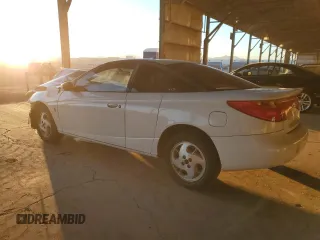 2002 Saturn SC with VIN 1G8ZY147X2Z232269, listed as a Copart auction lot 88364165 with 230,957 mi miles and Salvage Title. Bid and sale history available at carsss.com. Image 2.