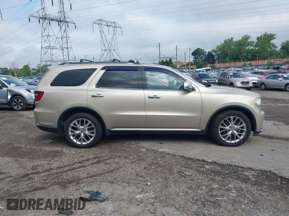 2015 Dodge Durango Citadel with VIN 1C4SDHET1FC702219, listed as a IAAI auction lot 42705080 with 159,995 mi miles and . Bid and sale history available at DreamBid. Image 14.