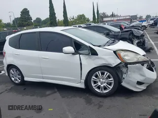 2010 Honda Fit Sport with VIN JHMGE8H43AC031411, listed as a IAAI auction lot 42599400 with 218,730 mi miles and . Bid and sale history available at DreamBid. Image 14.