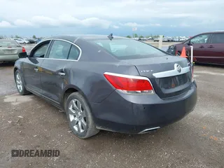 2013 Buick LaCrosse Leather z VIN 1G4GC5E38DF255922, wystawiony jako IAAI lot #41900015 z przebiegiem 103 733 mil mil oraz . Historia ofert i sprzedaży dostępna na DreamBid. Obrazek 3.