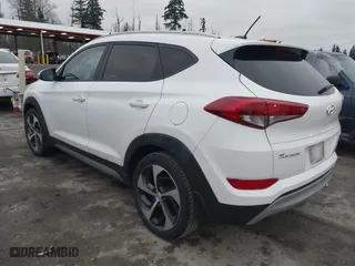 2017 Hyundai Tucson Value with VIN KM8J33A28HU301869, listed as a IAAI auction lot 41288511 with 111,143 mi miles. Bid and sale history available at carsss.com. Image 3.