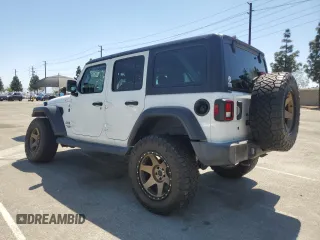 2018 Jeep Wrangler Unlimited Sport S with VIN 1C4HJXDG5JW172653, listed as a Copart auction lot 58184155 with 81,872 mi miles and Salvage title. Bid and sale history available at DreamBid. Image 2.