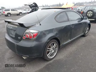 2010 Scion tC with VIN JTKDE3B75A0314185, listed as a IAAI auction lot 41369224 with 164,244 mi miles. Bid and sale history available at carsss.com. Image 4.
