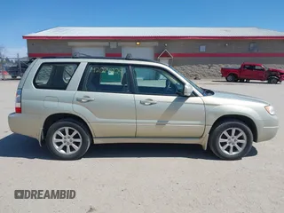 2007 Subaru Forester X w/Premium Pkg with VIN JF1SG65627H719188, listed as a IAAI auction lot 42074029 with 191,763 mi miles. Bid and sale history available at carsss.com. Image 14.