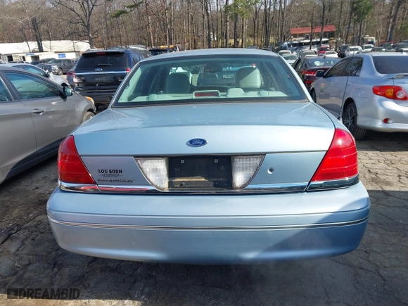 2005 Ford Crown Victoria LX with VIN 2FAFP74W65X135964, listed as a IAAI auction lot 41271175 with 82,494 mi miles. Bid and sale history available at carsss.com. Image 16.