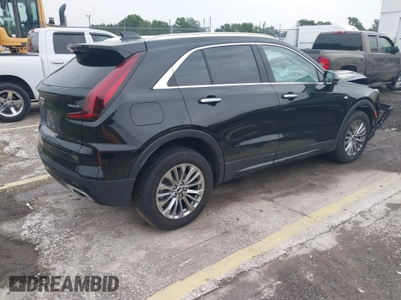 2024 Cadillac XT4 AWD Premium Luxury с VIN 1GYFZDR44RF147956, выставлен на аукционе IAAI как лот 42434595 с пробегом 26 328 миль миль и . История ставок и продаж доступна на DreamBid. Изображение 4.