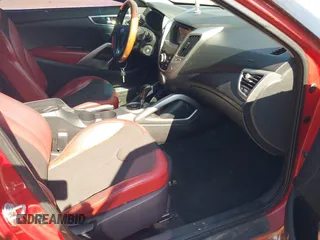 2012 Hyundai Veloster w/Black Int with VIN KMHTC6AD3CU032989, listed as a IAAI auction lot 42633748 with 137,727 mi miles and . Bid and sale history available at DreamBid. Image 5.