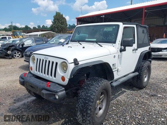 2012 Jeep Wrangler Sport z VIN 1C4AJWAG5CL171961, wystawiony jako IAAI lot #42590232 z przebiegiem 126 372 mil mil oraz . Historia ofert i sprzedaży dostępna na DreamBid. Obrazek 17.