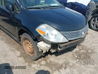 2009 Nissan Versa 1.8 S with VIN 3N1BC13E59L499006, listed as a IAAI auction lot 41953194 with 179,330 mi miles. Bid and sale history available at carsss.com. Image 1.