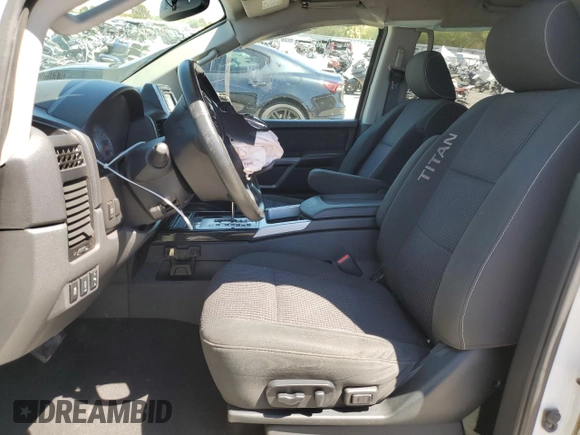 2015 Nissan Titan Pro-4X z VIN 1N6AA0EC9FN512658, wystawiony jako Copart lot #68066964 z przebiegiem 131 026 mil mil oraz Szkoda całkowita • Salvage title. Historia ofert i sprzedaży dostępna na DreamBid. Obrazek 7.