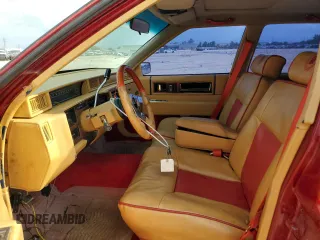 1991 Cadillac DeVille z VIN 1G6CD53B2M4335645, wystawiony jako Copart lot #53390805 z przebiegiem 210 451 mil mil oraz Szkoda całkowita • Salvage title. Historia ofert i sprzedaży dostępna na DreamBid. Obrazek 7.