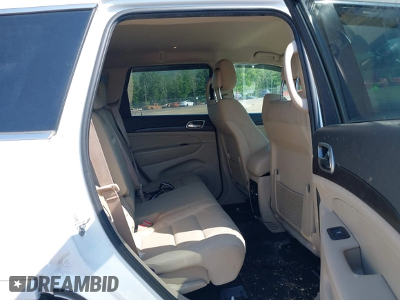 2018 Jeep Grand Cherokee Altitude with VIN 1C4RJFAG9JC162874, listed as a IAAI auction lot 42396844 with 102,321 mi miles and . Bid and sale history available at DreamBid. Image 8.