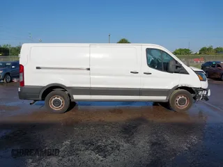 2021 Ford Transit Cargo with VIN 1FTBR1Y82MKA53386, listed as a IAAI auction lot 42058972 with 98,677 mi miles. Bid and sale history available at carsss.com. Image 14.