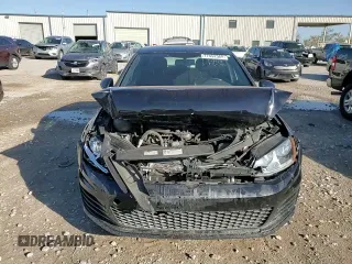 2015 Volkswagen GTI S z VIN 3VW5T7AU5FM100458, wystawiony jako Copart lot #77452564 z przebiegiem Nie podano mil oraz Szkoda całkowita • Salvage title. Historia ofert i sprzedaży dostępna na DreamBid. Obrazek 11.