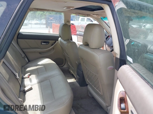 2002 Subaru Legacy Outback with VIN 4S3BE896127209841, listed as a IAAI auction lot 42494011 with 242,313 mi miles and . Bid and sale history available at DreamBid. Image 8.
