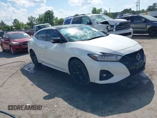 2021 Nissan Maxima SR with VIN 1N4AA6EV5MC504966, listed as a IAAI auction lot 42171255 with 87,903 mi miles and . Bid and sale history available at DreamBid. Image 1.