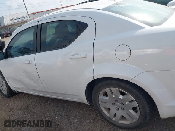 2013 Dodge Avenger SE with VIN 1C3CDZAB6DN548104, listed as a IAAI auction lot 41918928 with 189,315 mi miles and . Bid and sale history available at carsss.com. Image 15.