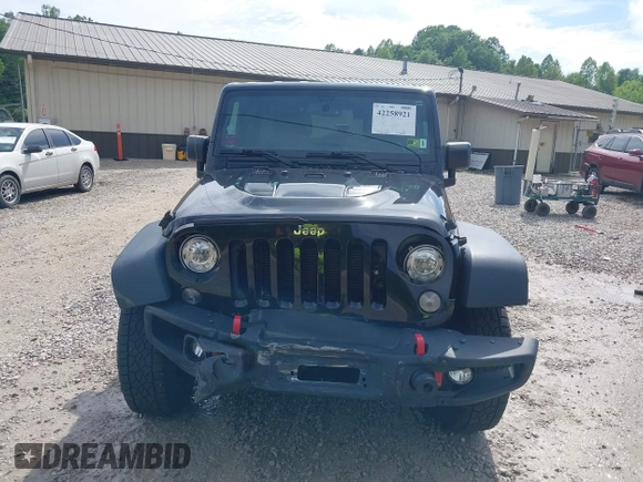 2017 Jeep Wrangler Unlimited Rubicon Recon z VIN 1C4HJWFG4HL507601, wystawiony jako IAAI lot #42258921 z przebiegiem 106 122 mil mil oraz . Historia ofert i sprzedaży dostępna na DreamBid. Obrazek 13.