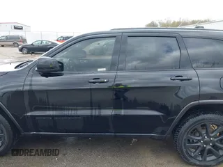 2018 Jeep Grand Cherokee Laredo with VIN 1C4RJFAG7JC468391, listed as a IAAI auction lot 42010443 with 91,585 mi miles and . Bid and sale history available at DreamBid. Image 14.