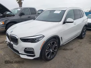 2021 BMW X5 sDrive40i with VIN 5UXCR4C0XM9F73416, listed as a IAAI auction lot 41722856 with 25,115 mi miles. Bid and sale history available at carsss.com. Image 2.