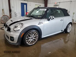 2013 MINI Convertible S with VIN WMWZP3C50DT550943, listed as a Copart auction lot 62070255 with 63,122 mi miles and Salvage title. Bid and sale history available at DreamBid. Image 1.