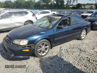 2001 Nissan Maxima GXE with VIN JN1CA31D51T608287, listed as a Copart auction lot 55118635 with 169,075 mi miles and Salvage title. Bid and sale history available at DreamBid. Image 1.