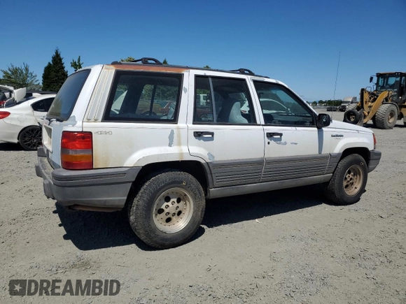 1993 Jeep Grand Cherokee Laredo с VIN 1J4GZ58S2PC654248, выставлен на аукционе Copart как лот 61259735 с пробегом 251 360 миль миль и Списание • Salvage title. История ставок и продаж доступна на DreamBid. Изображение 3.
