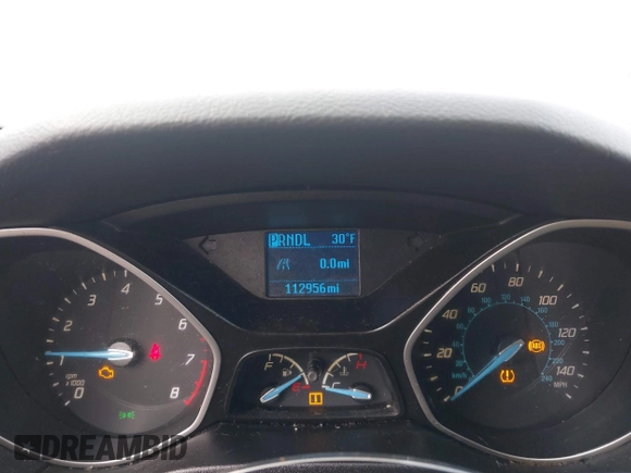 2013 Ford Focus S with VIN 1FADP3E20DL332636, listed as a IAAI auction lot 40917274 with 112,956 mi miles. Bid and sale history available at carsss.com. Image 7.