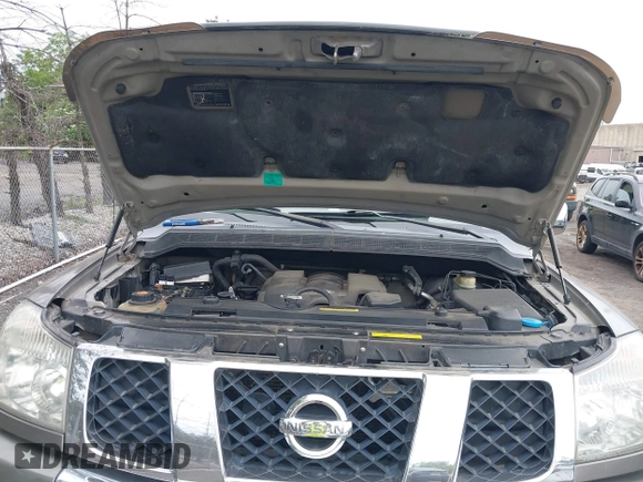 2006 Nissan Titan XE z VIN 1N6BA07A46N505410, wystawiony jako IAAI lot #42345334 z przebiegiem 267 891 mil mil oraz . Historia ofert i sprzedaży dostępna na DreamBid. Obrazek 10.