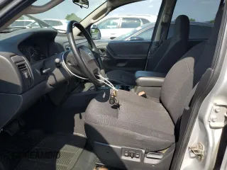 2004 Jeep Grand Cherokee Laredo with VIN 1J4GW48S44C282992, listed as a Copart auction lot 61523685 with 112,486 mi miles and Clean title. Bid and sale history available at DreamBid. Image 7.