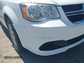 2015 Dodge Grand Caravan American Value with VIN 2C4RDGBG1FR748088, listed as a IAAI auction lot 42052160 with 248,540 mi miles and . Bid and sale history available at DreamBid. Image 12.