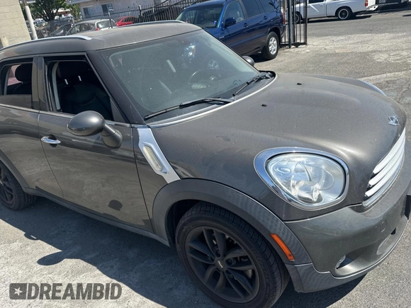 2012 MINI Countryman with VIN WMWZB3C52CWM05723, listed as a Copart auction lot 63713495 with 114,433 mi miles and Clean title. Bid and sale history available at DreamBid. Image 1.