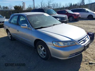 2002 Honda Accord EX z VIN 1HGCG56542A144609, wystawiony jako IAAI lot #41706668 z przebiegiem 220 536 mil mil oraz . Historia ofert i sprzedaży dostępna na DreamBid. Obrazek 1.