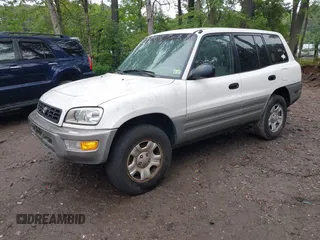 2000 Toyota RAV4 with VIN JT3GP10V0Y0051638, listed as a IAAI auction lot 42374740 with 270,258 mi miles and . Bid and sale history available at DreamBid. Image 2.